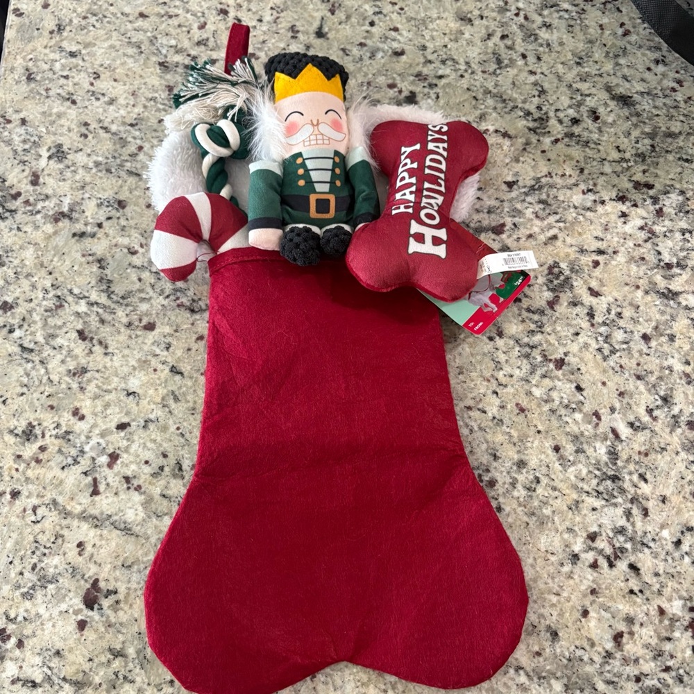 Merry Makings 4-piece dog toy set New with Tag in a red stocking